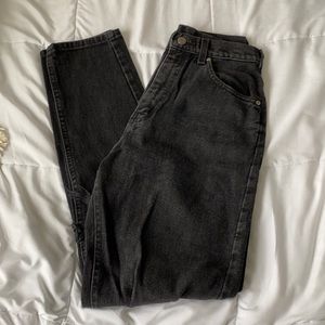 Vintage black Lee jeans. Cool detail on the back